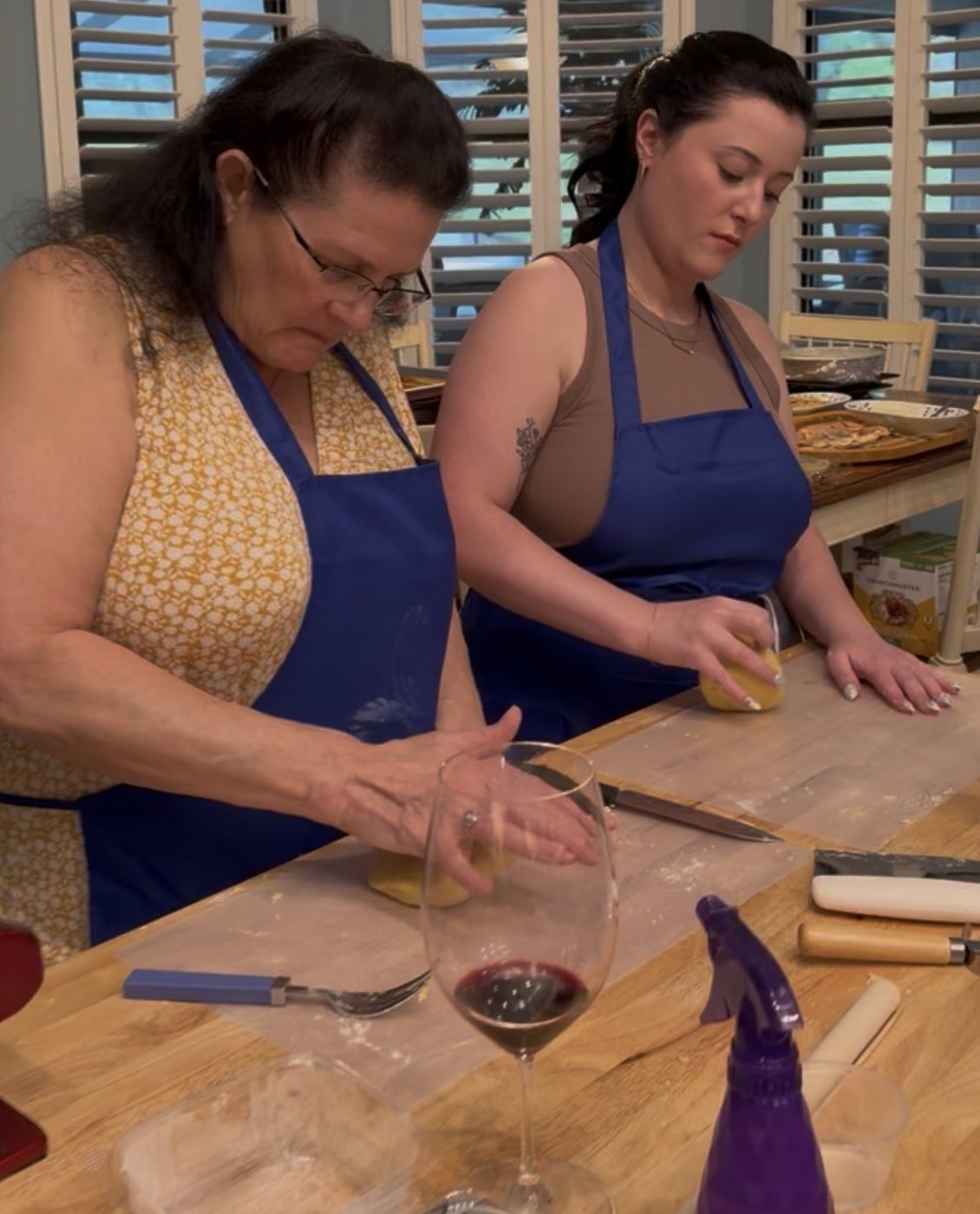 A joyful pasta-making class in a home kitchen